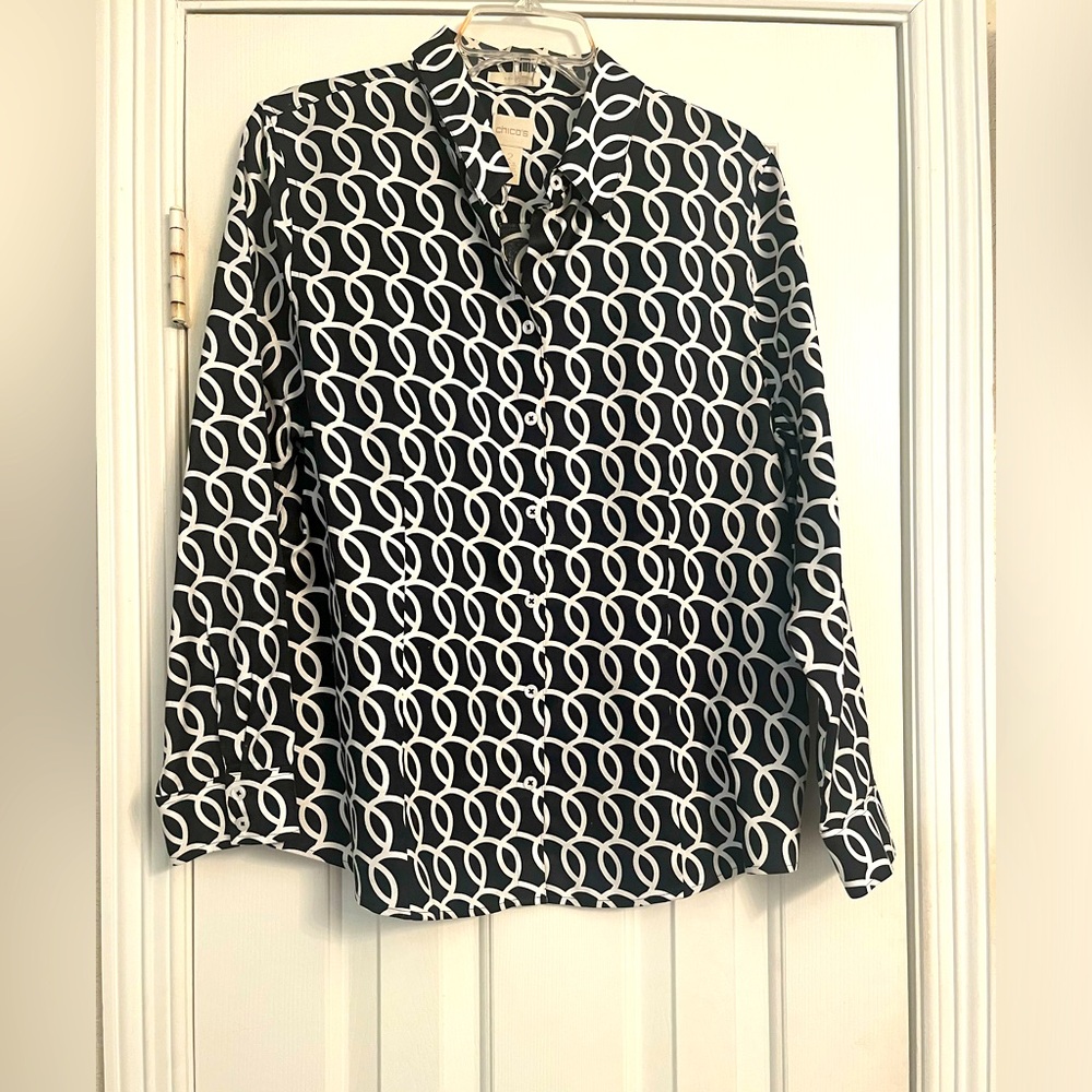 Chico’s top in back and white design.  size 2